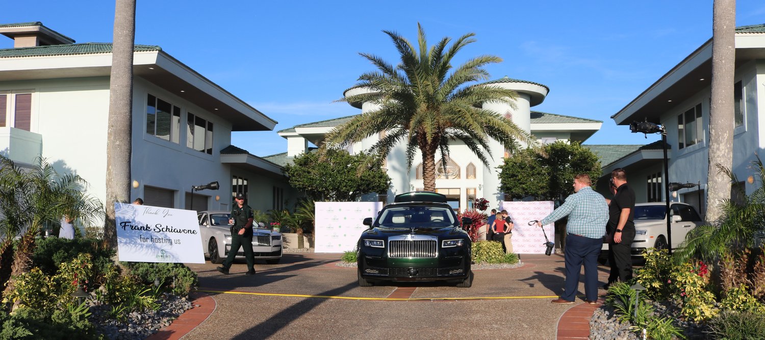 A Rolls Royce sits in front of the home on Ponte Vedra Boulevard where the party was held.